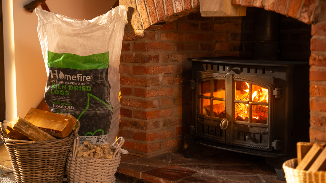 Homefire Kiln Dried Firewood Handy Bag in front of the fireplace